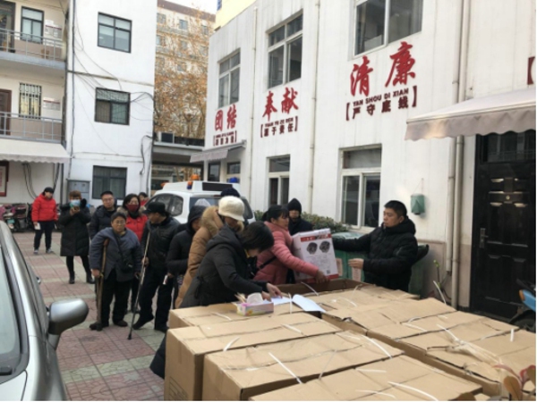 管城区街道商会开展“关爱残疾人  真情送温暖”活动(图1)